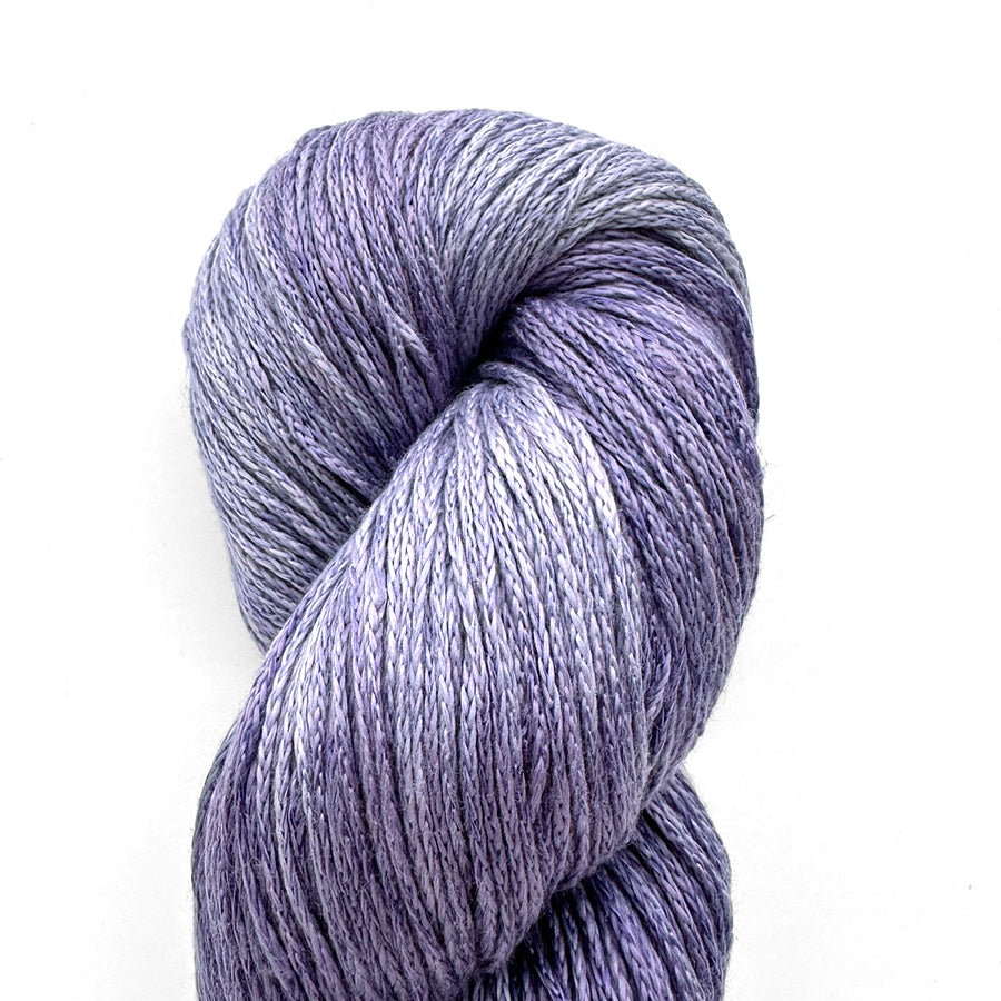 Berroco Tillie yarn in soft cotton and cupro blend, shown in a range of pastel and neutral shades, ideal for lightweight summer knits.
